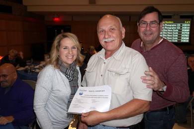 Denise and Tom posing with Bob Bak who just won a trip to the Red Sea at LIDA Film Festival