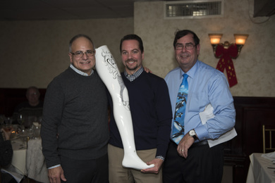 Gene Miceli being presented the "Leg Up" award by Jack Ricotta and Tom Butcher